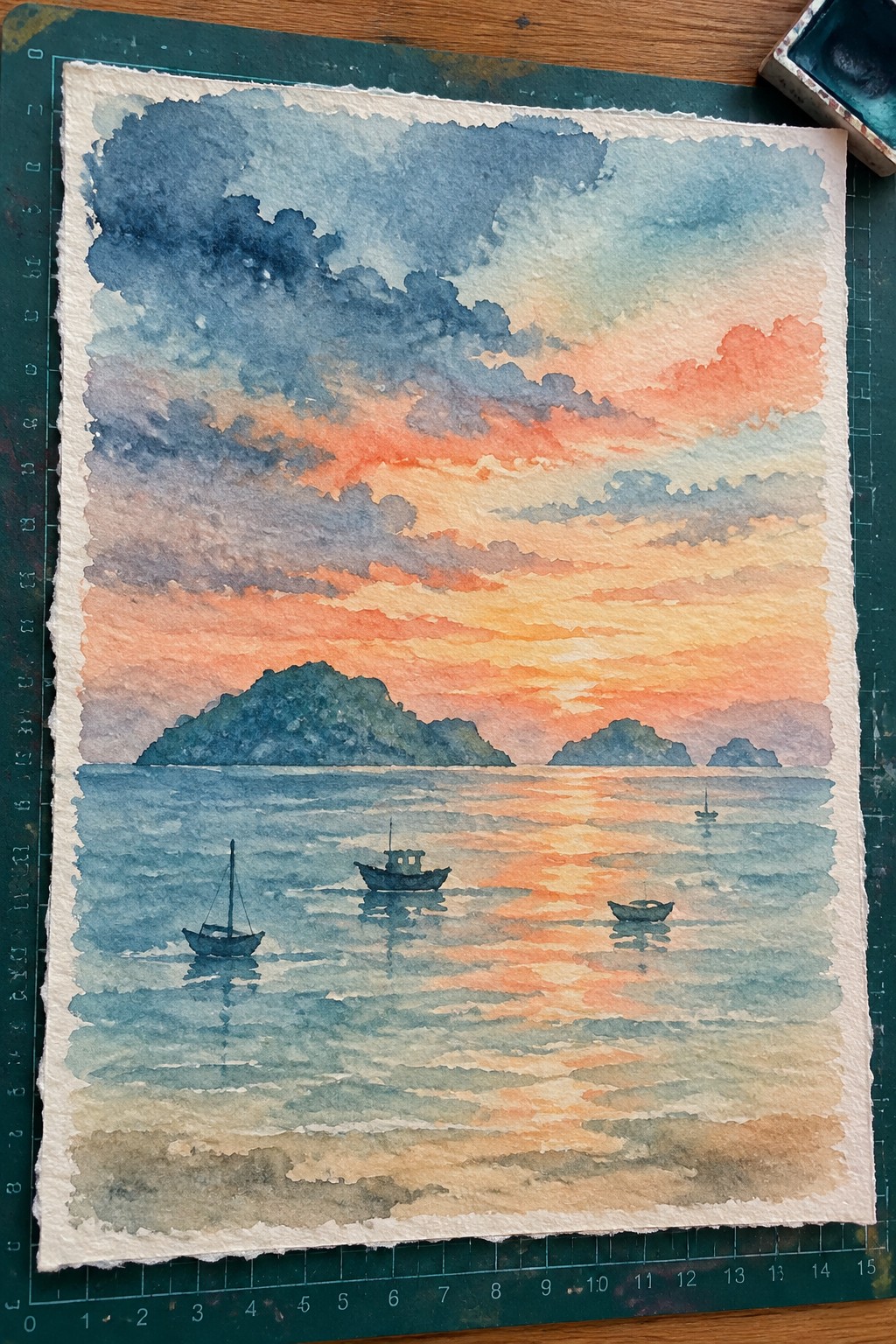 Watercolor sunset seascape with orange-pink clouds, calm sea, boats, and distant islands