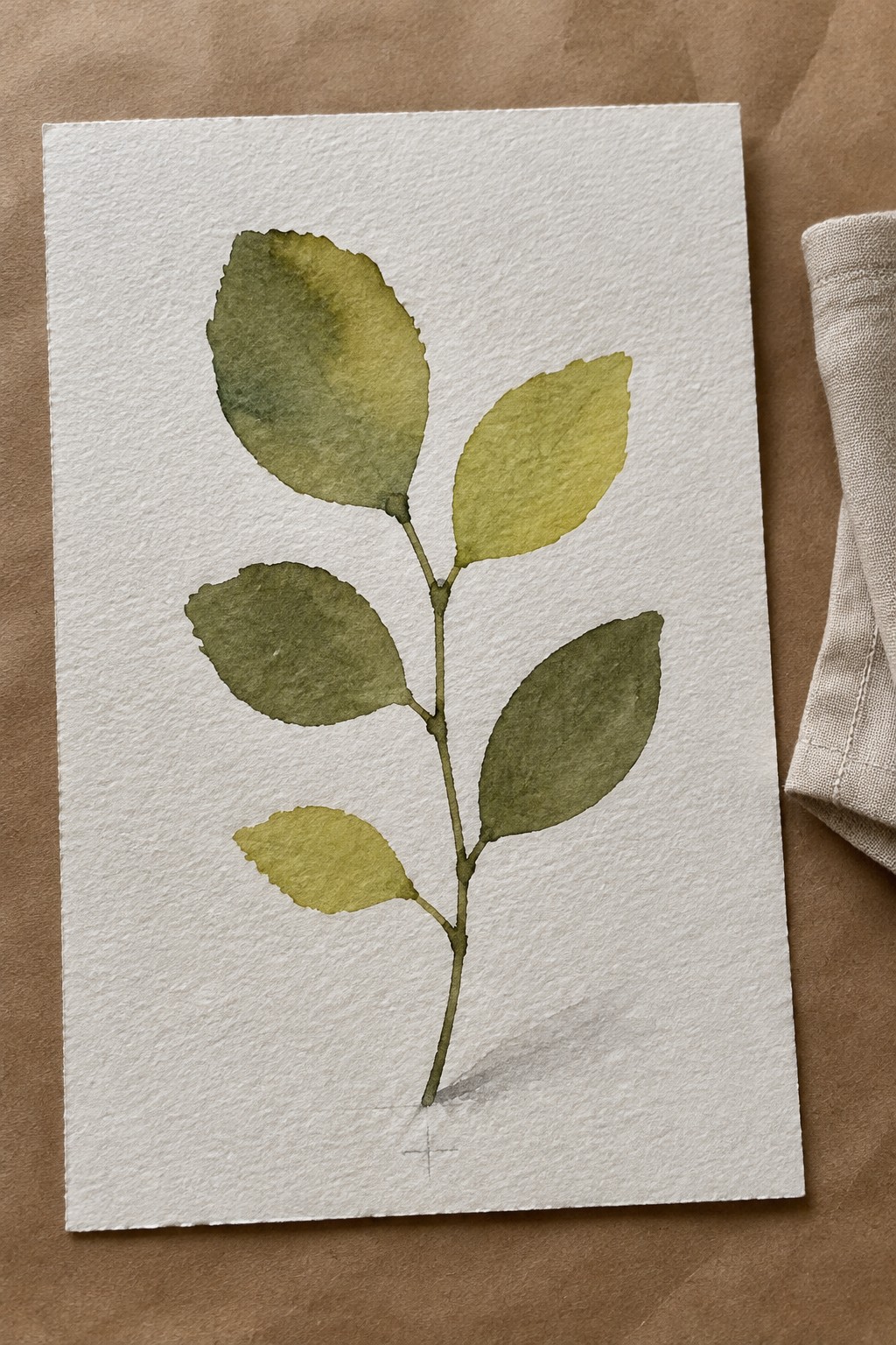 A watercolor painting of a thin stem with several oval leaves in shades of green and yellow-green on white paper.