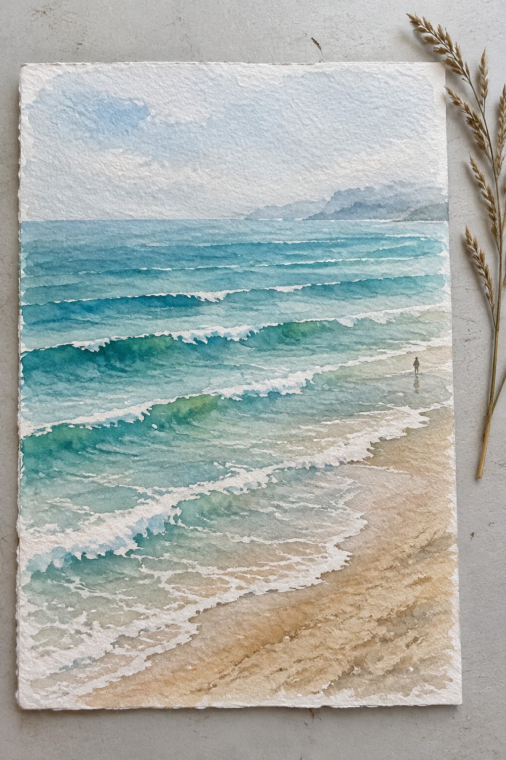 Watercolor painting of turquoise waves on a sandy beach with a lone figure and distant hills.