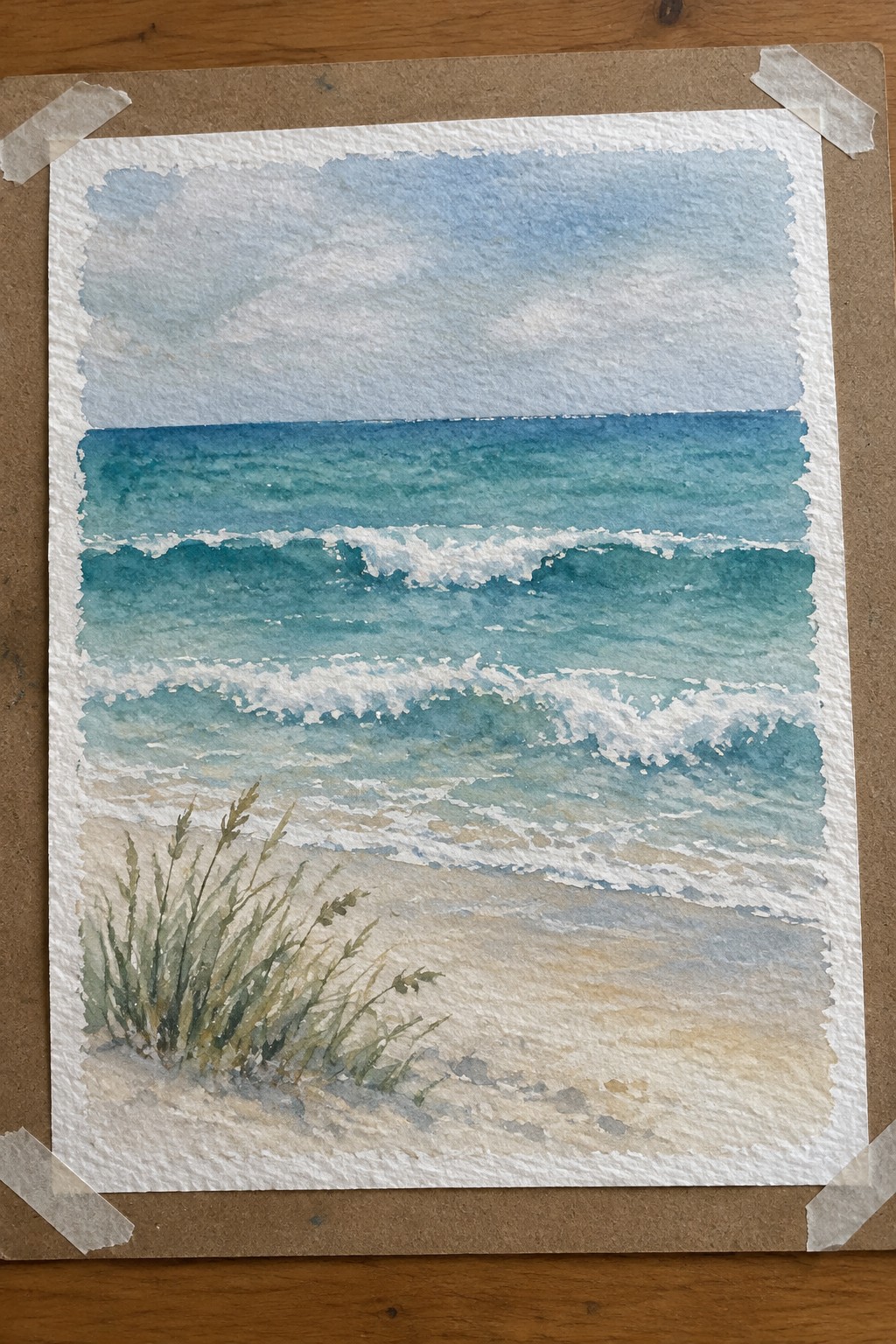 Watercolor seascape of turquoise waves with white foam on sandy beach with grass