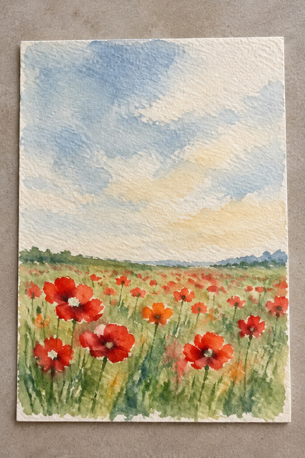 Watercolor painting of red poppies blooming in a green field under a cloudy sky